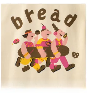 Detail of cartoon bread print with brown letters on cream cotton t-shirt fabric