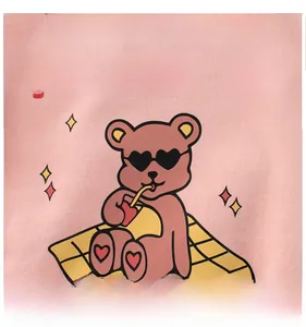 Detail of cartoon bear print with sunglasses and summer text on pink kids sweatshirt