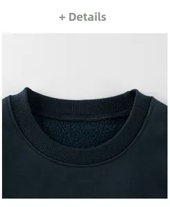 Detail view of ribbed neckline and thick warm fleece lining on navy blue sweatshirt