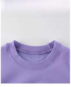 Detail view of the purple round neck sweatshirt with warm fleece lining and ribbed collar