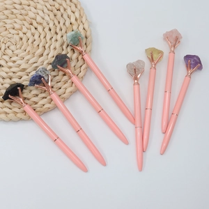 Pink crystal ballpoint pens with natural raw gemstones and rose gold metal accents