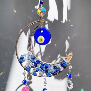 Handmade moon suncatcher with amethyst evil eye and rainbow crystals for garden decor