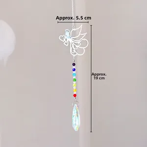 Detail of silver angel suncatcher with colorful beads and crystal teardrop prism