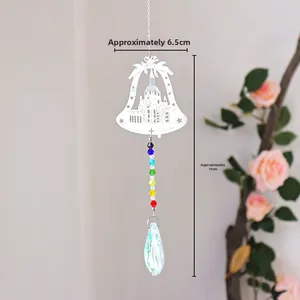Detailed view of silver bell ornament with colorful crystal beads and suncatcher drop