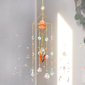 Macro detail of golden suncatcher crystal prisms reflecting rainbow light patterns