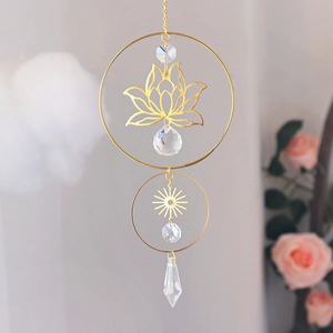 Golden sun catcher with lotus flower and crystal ball hanging for home decoration