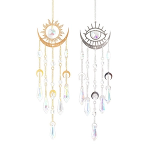 Acchiappasole in cristallo K9 con ciondoli sole oro e occhio argento in stile celeste