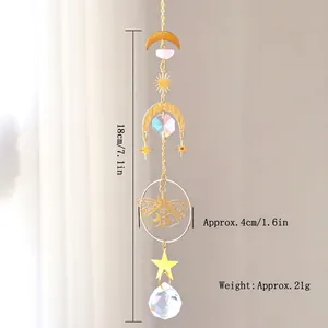 Golden moon and star suncatcher with pink gemstones and multi-faceted crystal ball