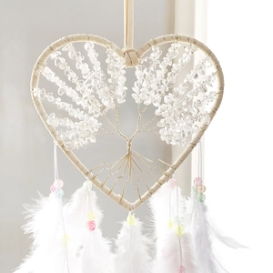 Heart-shaped dream catcher with tree of life crystal stones and white hanging feathers