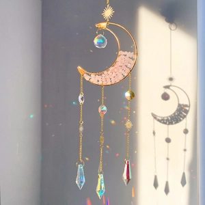 Detailed suncatcher view with pink crystal moon and rainbow prism reflections