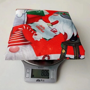Kitchen scale showing the 88.6g weight of a burlap Christmas chair cover