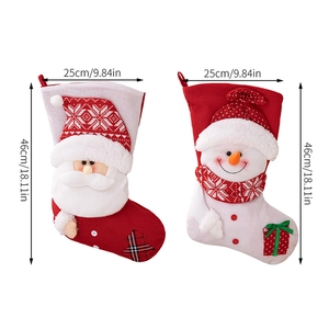 Detail of knitted Christmas stockings showing Santa and snowman designs, 46cm x 25cm size