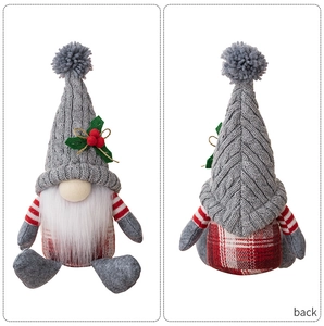 Front and back detail of a Nordic Christmas gnome plush with grey knit hat and red plaid body