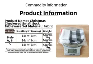 Detail showing red plaid Christmas stocking cutlery holder dimensions and 14g weight on scale