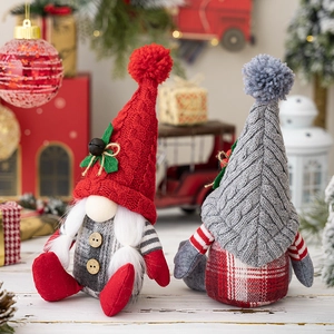 Nordic sitting Christmas gnomes set with red and grey knitted hats and plush beards