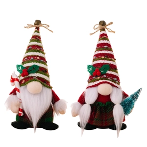 Christmas gnomes set with striped hats holding candy cane and mini Christmas tree