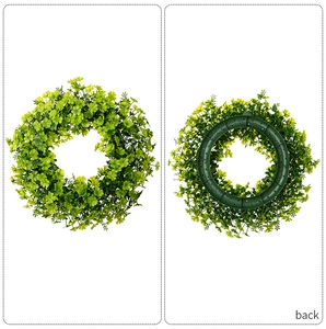 Detailed front and back view of St. Patrick's Day green clover wreath with plastic frame