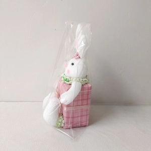Easter plush bunny with pink bow and plaid gift box in clear display packaging
