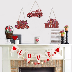 Rustic Valentine's Day fireplace decor set with red heart wood signs and LOVE banner