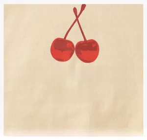 Detail of red cherry graphic print and FRUIT lettering on beige cotton long sleeve shirt