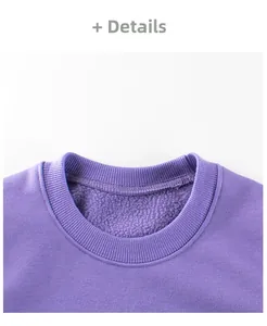 Detailed close-up of ribbed crewneck collar on purple polar fleece kids sweatshirt