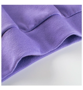 Detail of purple toddler sweatshirt showing high-quality ribbed cuffs and fleece fabric