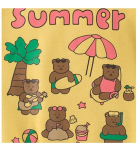 Detailed view of kids' sweatshirt featuring cartoon bears and summer beach print