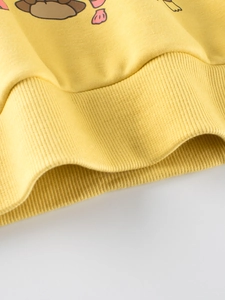 Kids yellow fleece sweatshirt featuring a premium ribbed hem and soft cotton fabric