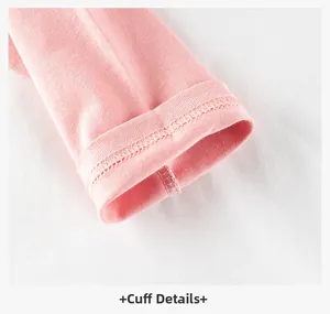 Nahaufnahme des rosa langärmeligen Baumwoll-T-Shirt-Bündchens mit hochwertiger Doppelnaht
