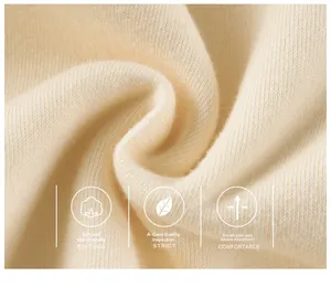 Macro detail of soft cream ribbed knit cotton fabric with skin-friendly texture