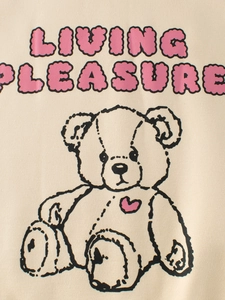Kids beige sweatshirt with teddy bear and pink Living Pleasure bubble font text