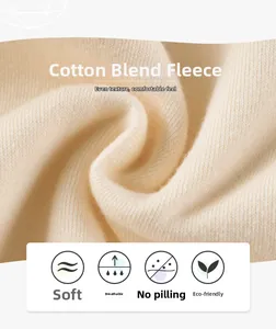 Detailed close-up of soft beige cotton-blend polar fleece fabric texture for children sweatshirt