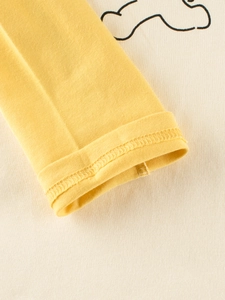 Long sleeve cotton t-shirt for kids featuring yellow contrast sleeves and neat stitching