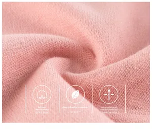 Détail du tissu en maille rose de classe A, doux, respirant et respectueux de la peau