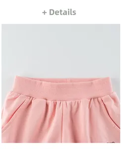 Détails du pantalon rose pour enfant avec taille élastique et poches latérales
