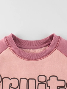 Sweat en polaire bicolore rose pour enfants avec manches raglan contrastées et col rond