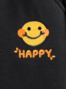 Pantaloni sportivi neri per bambini con ricamo faccina gialla e scritta HAPPY