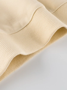 Dobladillo de sudadera beige para niños en punto acanalado con costuras dobles de lujo