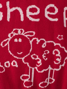 Kids red knit sweater with white sheep jacquard pattern for autumn and winter season