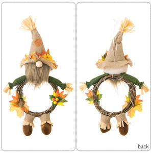 Front and back view of Thanksgiving harvest gnome wreath with maple leaves and berries