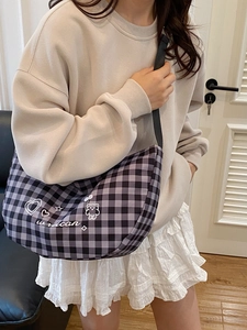 Purple plaid crescent crossbody bag featuring bear embroidery and adjustable strap