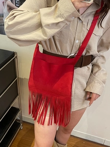 Vintage red faux suede crossbody bag with long tassels and thin shoulder strap for women