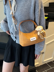 Cute brown faux suede shoulder bag with a teddy bear pendant for women's daily travel