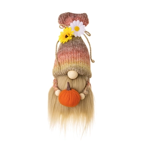 Harvest gnome plush with daisy knit hat holding an orange pumpkin on white background