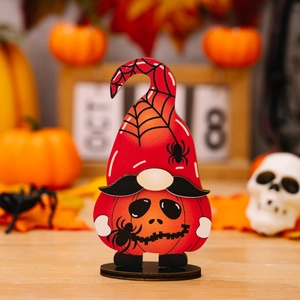 Detailed view of a wooden Halloween gnome figurine with pumpkin and spider web motifs