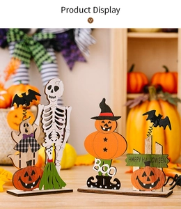 Detail of wooden Halloween table signs featuring ghosts, pumpkins, and spooky characters