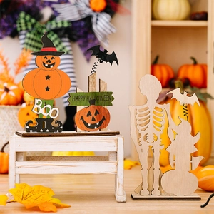Detail of wooden Halloween desktop decorations featuring Boo signs and spring bats