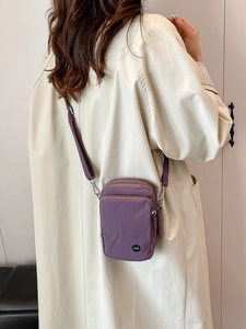 Elegant purple nylon crossbody phone bag for women with adjustable strap and logo