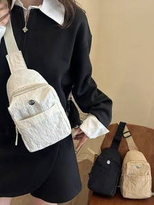 Fashionable nylon crossbody chest bag with adjustable strap and metal logo decoration