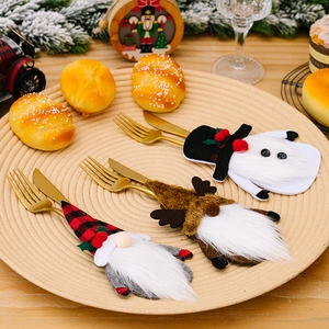 Christmas gnome cutlery holders set with reindeer and snowman themes for festive table decor